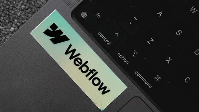 Webflow-Logo auf einem MacBook.